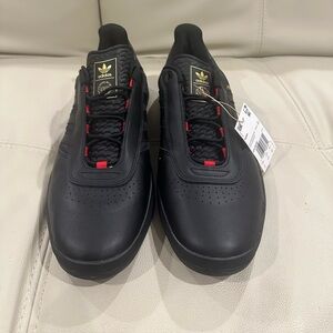 Adidas PUIG black and red leather men’s sneakers Size 13.5 New